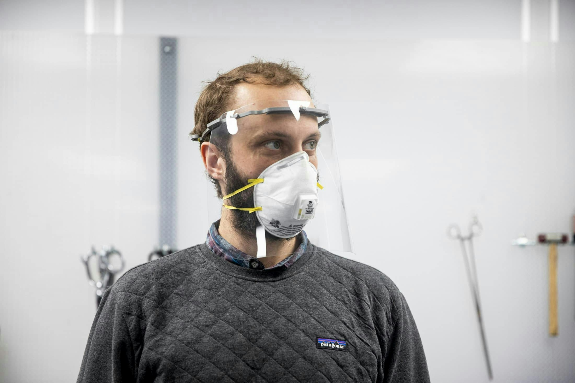 Former Santa Cruz Engineer (now project manager) Zach Wick wearing an N-95 Face mask and a face shield