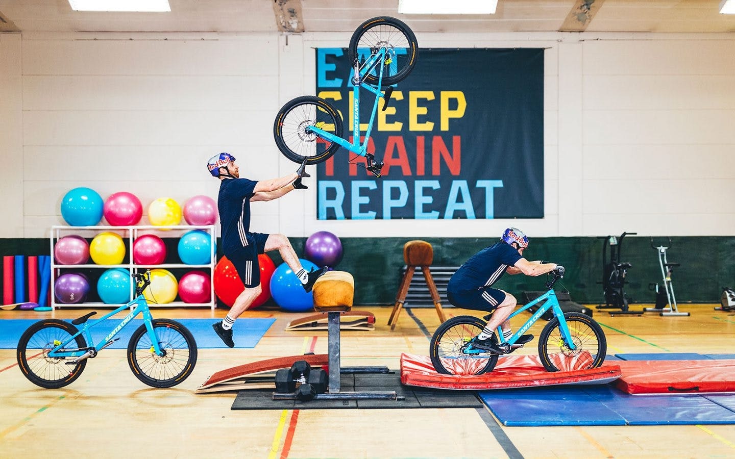 Danny MacAskill riding his carbon trials bike in a gymnasium