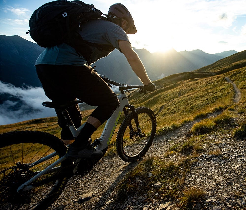Ash Smith pedaling into the sunset on his Heckler MX