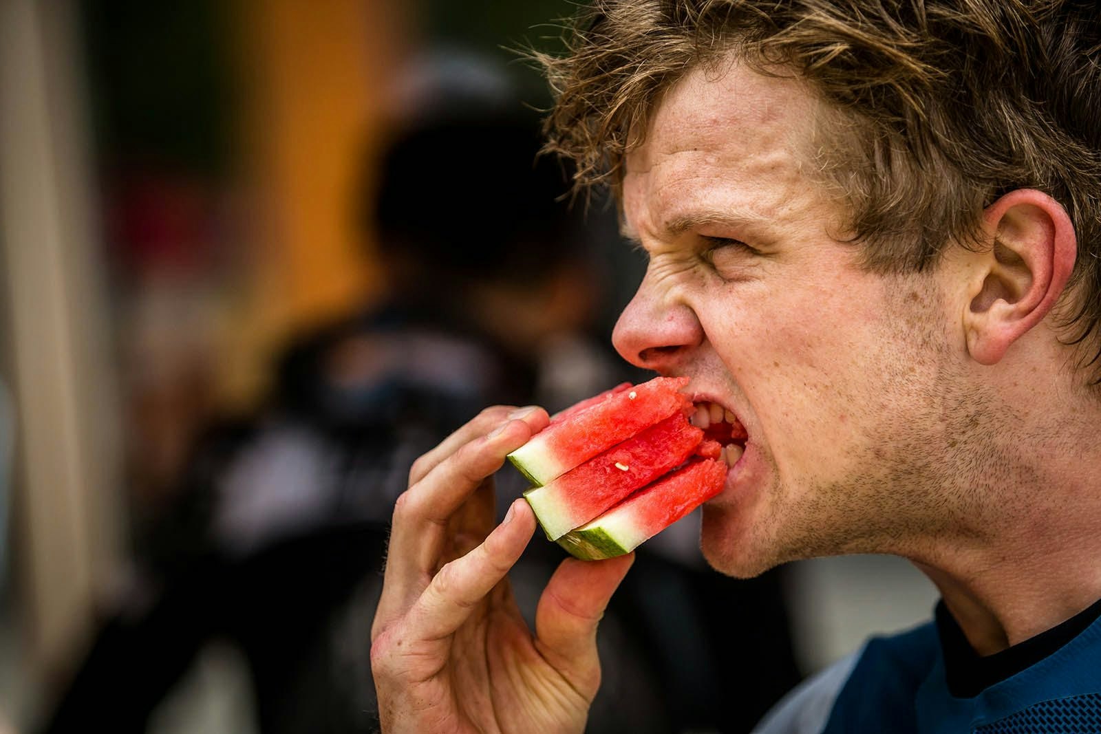 Mark Scott eating 3 watermelon slices