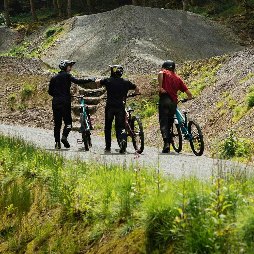 Three mountain bikers with 5010s