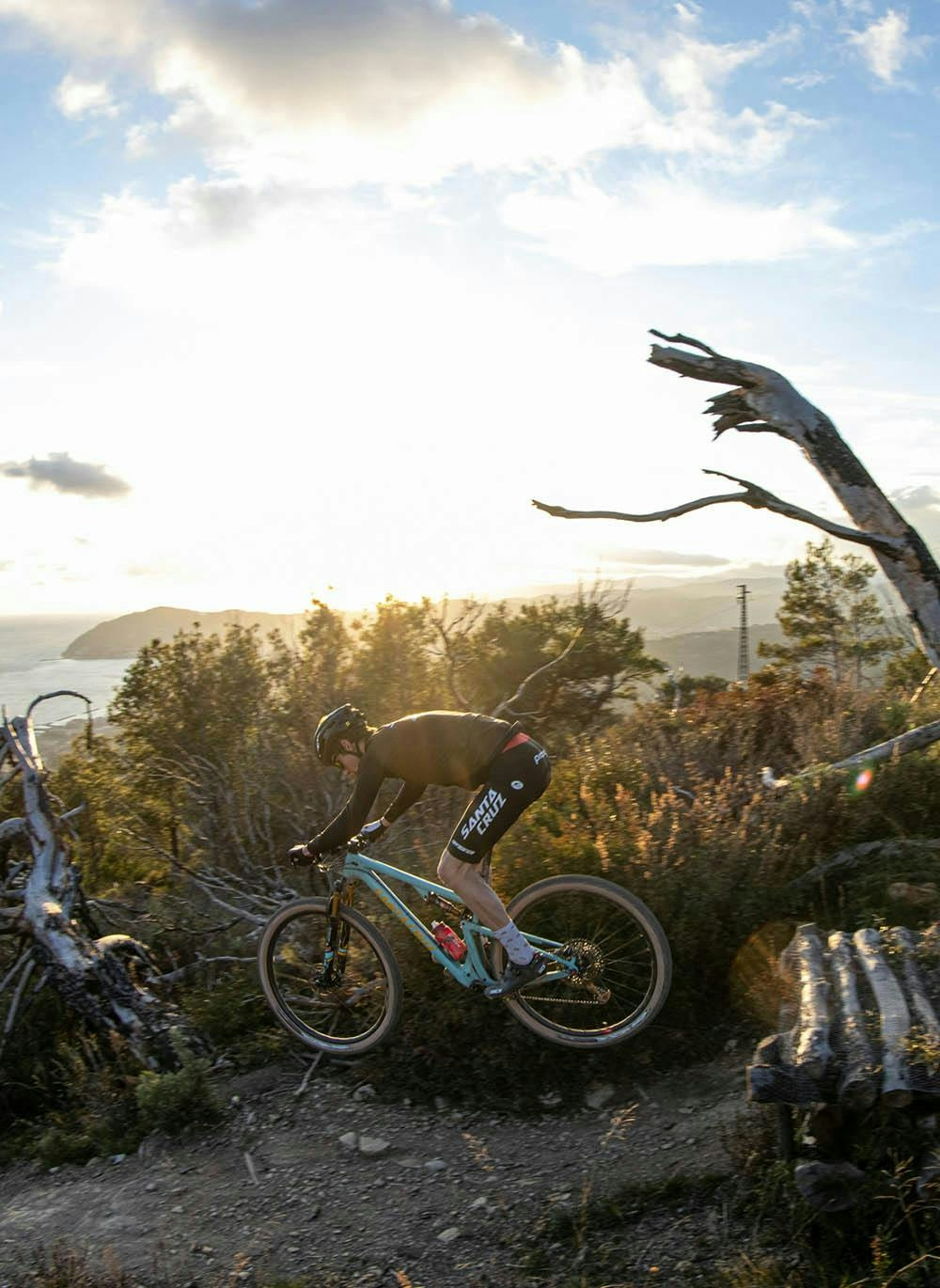 Luca Braidot hitting a jump on his Blur mountain bike